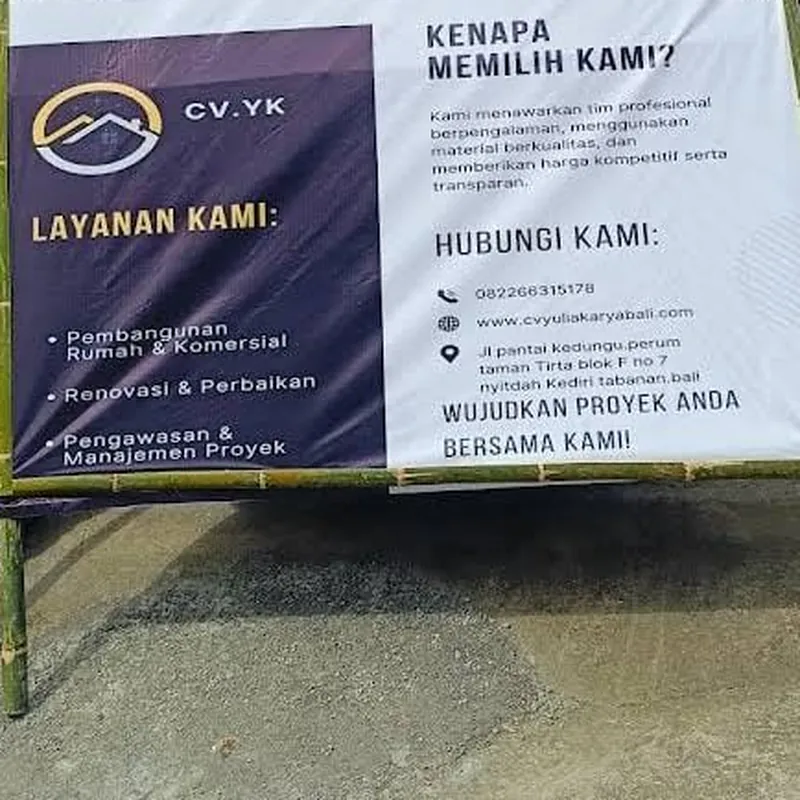 Our company banner listing services and contact details on a bamboo frame